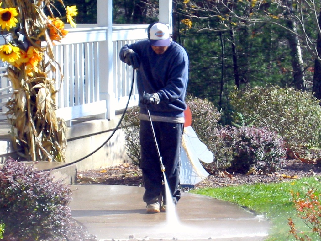 man doing pressure washing services 3