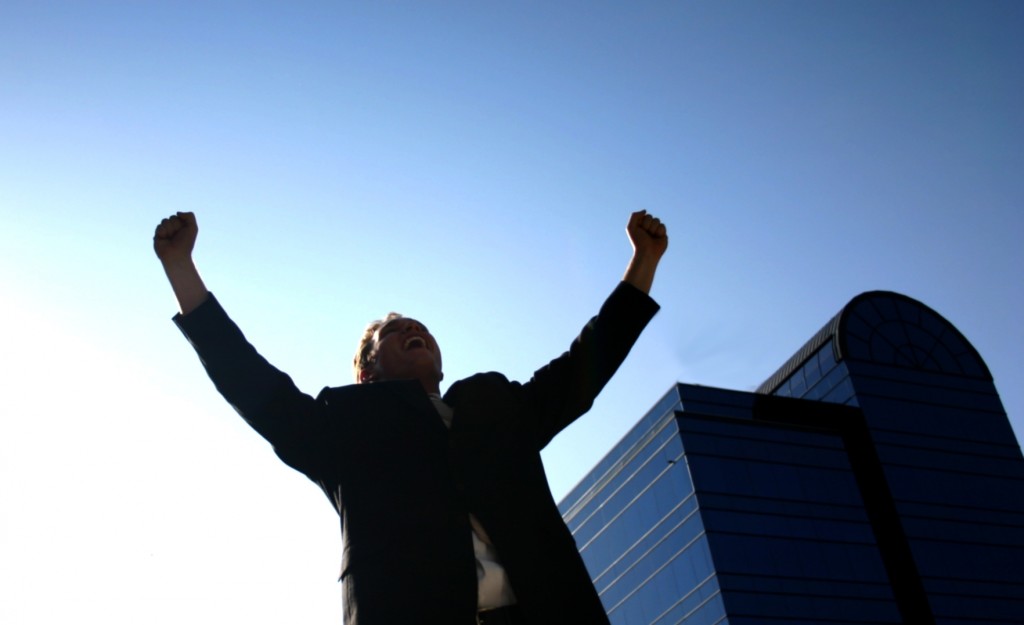 man lifting arms